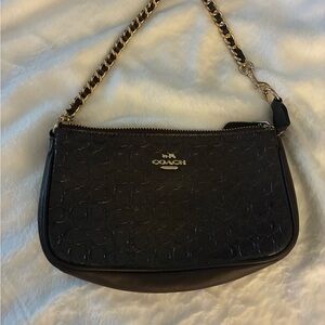 Coach Maroon, aka deep burgundy, evening bag/wristlet.  2 inside pockets.